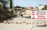 Burhaniye’de yol yapım ve onarım çalışmaları  hız kesmeden devam ediyor