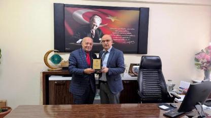 Kardelen’den  Aydemir’e Teşekkür Plaketi