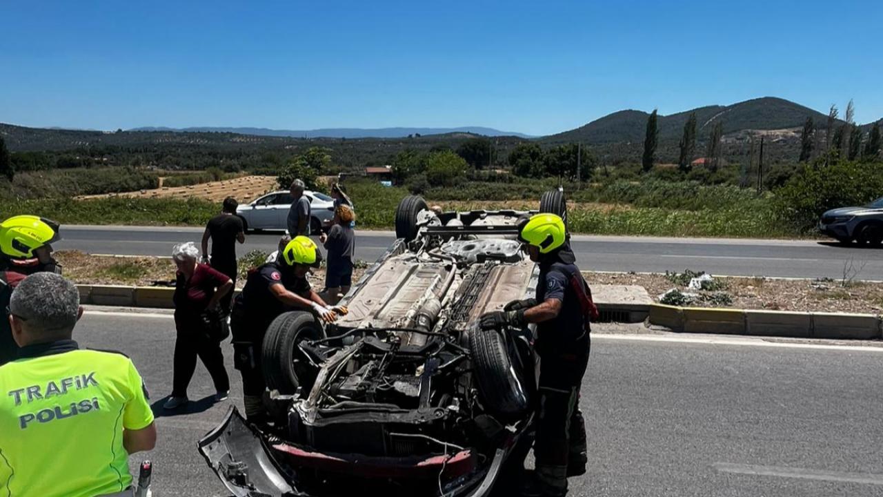 Burhaniye’de Otomobil Takla Attı: Sürücü Yaralandı