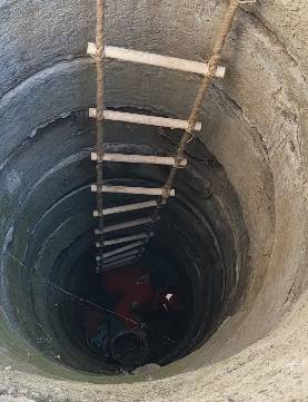Burhaniye'de Kuyuya Düşen Yavru Kedi Kurtarıldı